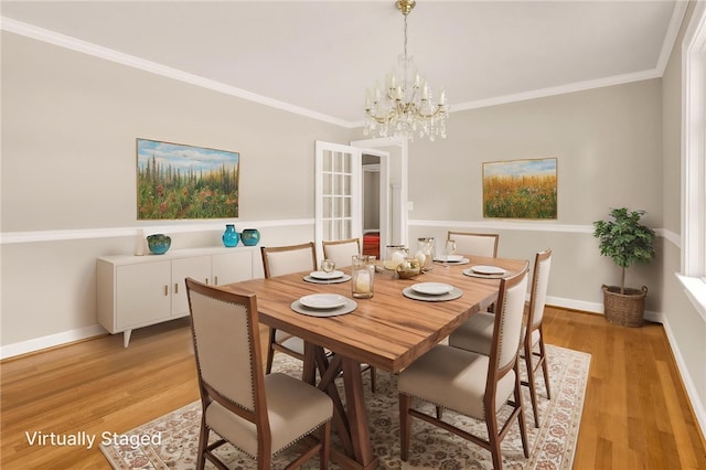 1142 Fox Squirrel Ridge Rd, Pickens, SC 29671 - dining space with a chandelier, crown molding, light wood-style floors, and baseboards