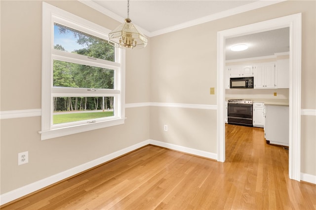 1142 Fox Squirrel Ridge Rd, Pickens, SC 29671 - unfurnished dining area with a chandelier, light wood-type flooring, baseboards, and crown molding