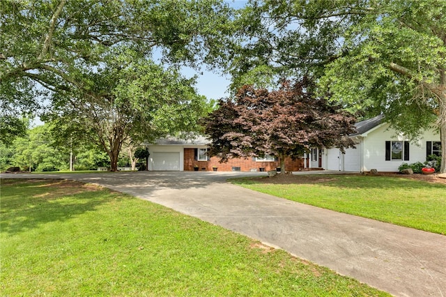 1142 Fox Squirrel Ridge Rd, Pickens, SC 29671 - view of property hidden behind natural elements featuring an attached garage, concrete driveway, and a front yard