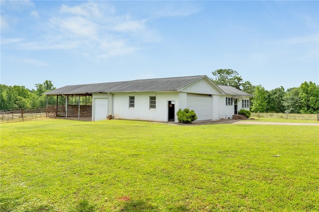 1142 Fox Squirrel Ridge Rd, Pickens, SC 29671 - back of property featuring an exterior structure, an attached garage, driveway, and an outbuilding