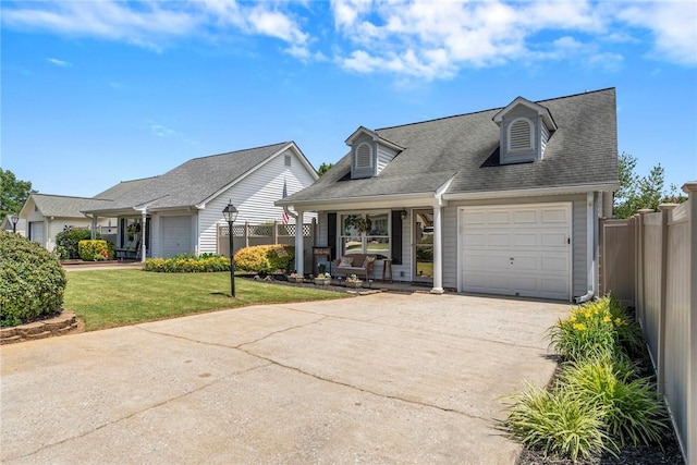 104 Brittania Cir, Anderson, SC 29621 - view of front of house with a garage, driveway, covered porch, and roof with shingles