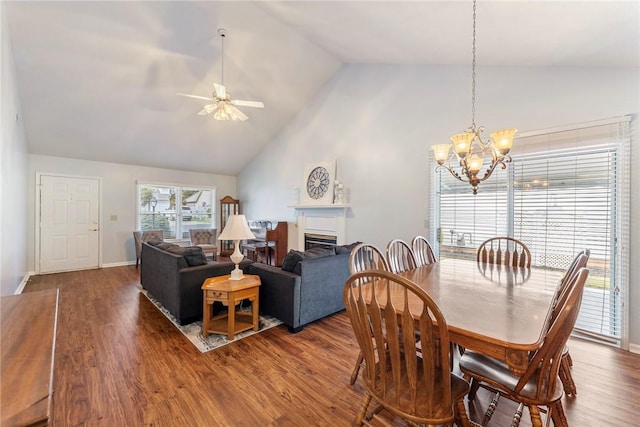 104 Brittania Cir, Anderson, SC 29621 - dining room featuring high vaulted ceiling, ceiling fan, a chandelier, a fireplace, and wood finished floors