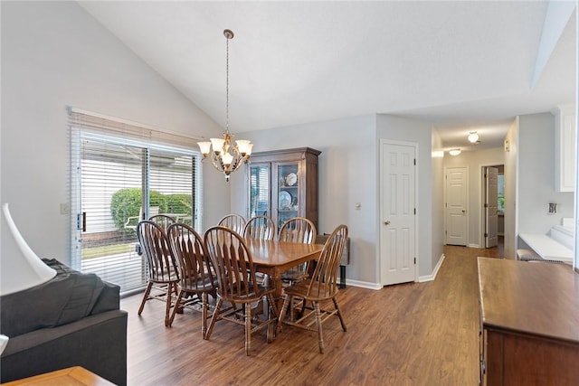 104 Brittania Cir, Anderson, SC 29621 - dining room with a chandelier, wood finished floors, vaulted ceiling, and baseboards