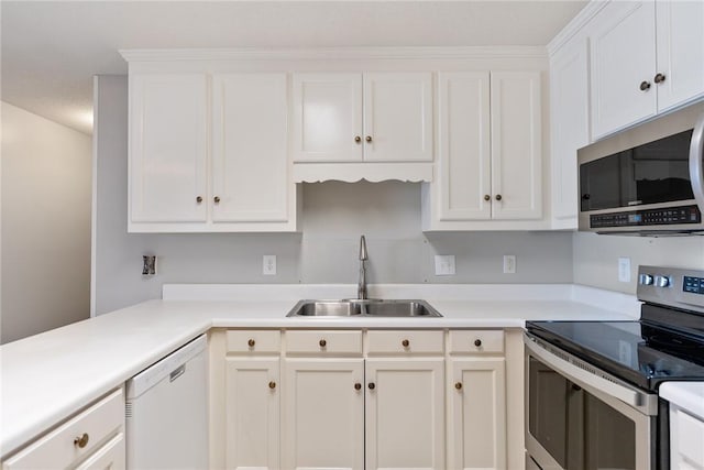 104 Brittania Cir, Anderson, SC 29621 - kitchen with stainless steel appliances, a sink, light countertops, and white cabinets