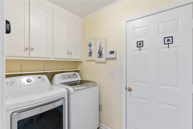 104 Brittania Cir, Anderson, SC 29621 - laundry area with washing machine and clothes dryer, cabinet space, and crown molding