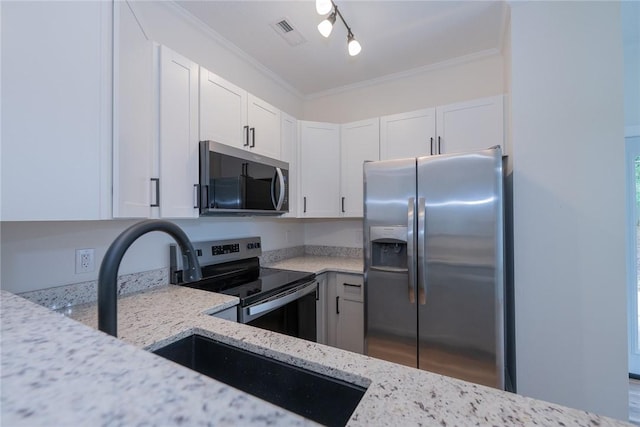 2413 Annandale Dr, Anderson, SC 29621 - kitchen featuring stainless steel appliances, white cabinetry, light stone countertops, ornamental molding, and a sink