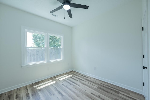 2413 Annandale Dr, Anderson, SC 29621 - unfurnished room with light wood-style floors, ceiling fan, and baseboards
