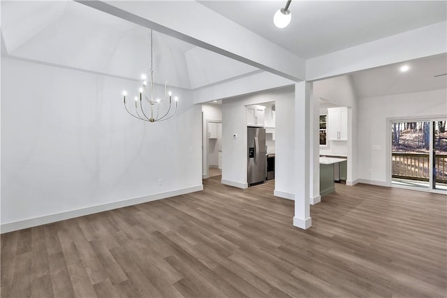 36 Pine Garden Way Dr, Salem, SC 29676 - unfurnished living room featuring vaulted ceiling, a chandelier, and wood finished floors