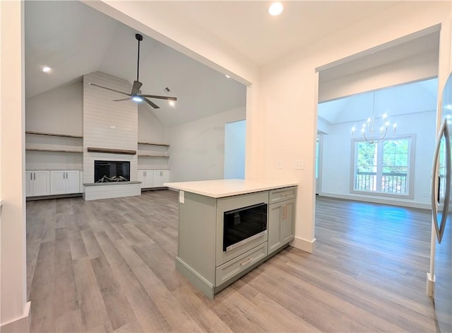 36 Pine Garden Way Dr, Salem, SC 29676 - kitchen with built in microwave, ceiling fan, a chandelier, gray cabinets, and light countertops