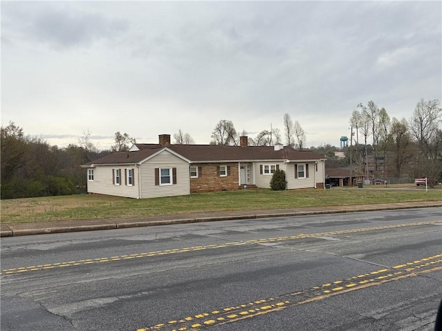 611 E S 6th St, Seneca, SC 29678 - ranch-style house featuring a chimney and a front lawn