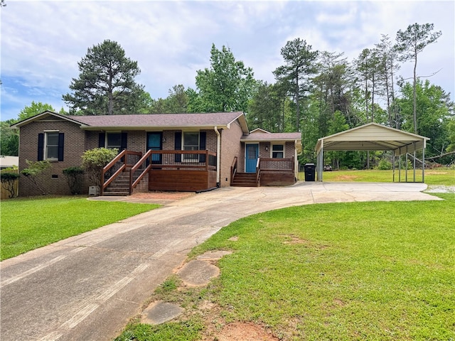 5265 Slater Rd, Anderson, SC 29621 - single story home featuring a carport, concrete driveway, brick siding, covered porch, and a front lawn