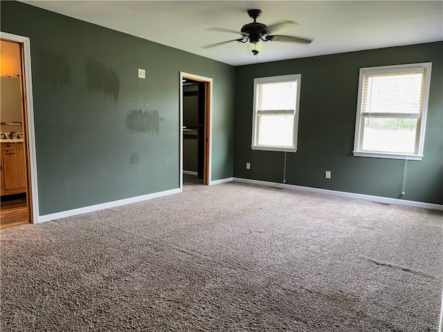 5265 Slater Rd, Anderson, SC 29621 - carpeted empty room featuring a ceiling fan, baseboards, and a sink