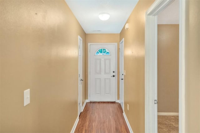 123 Stevens Ct, Williamston, SC 29697 - doorway to outside with baseboards and wood finished floors