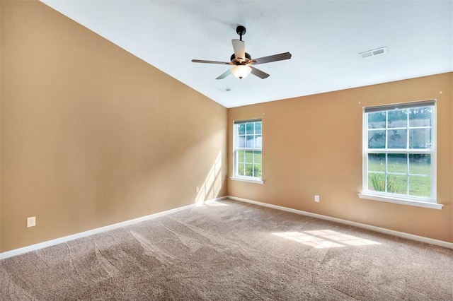 123 Stevens Ct, Williamston, SC 29697 - empty room featuring carpet flooring, ceiling fan, vaulted ceiling, and baseboards