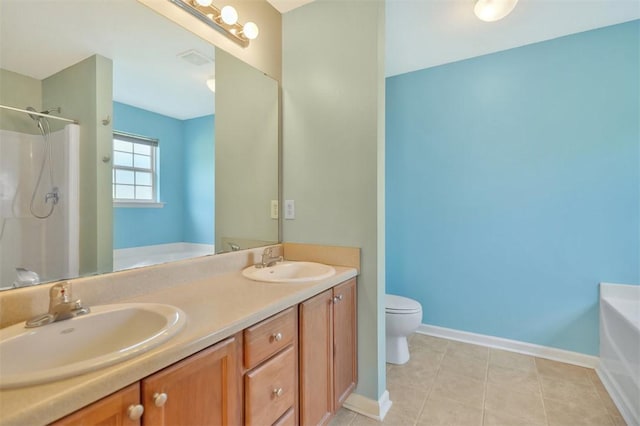 123 Stevens Ct, Williamston, SC 29697 - bathroom featuring a garden tub, toilet, double vanity, baseboards, and a shower