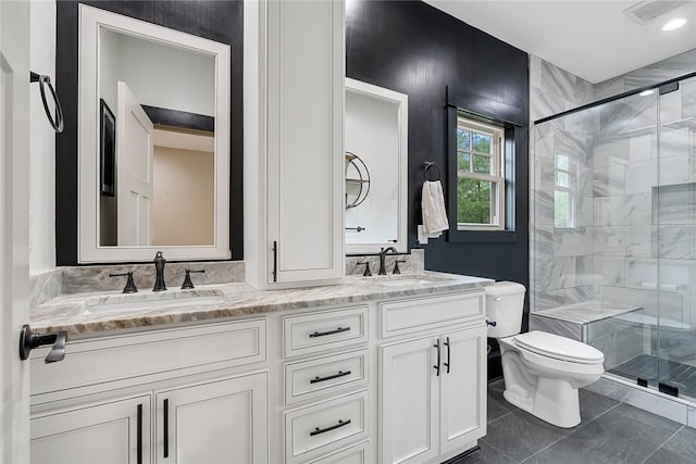 1104 Little River View Dr, Seneca, SC 29672 - bathroom featuring toilet, double vanity, a stall shower, and tile patterned flooring