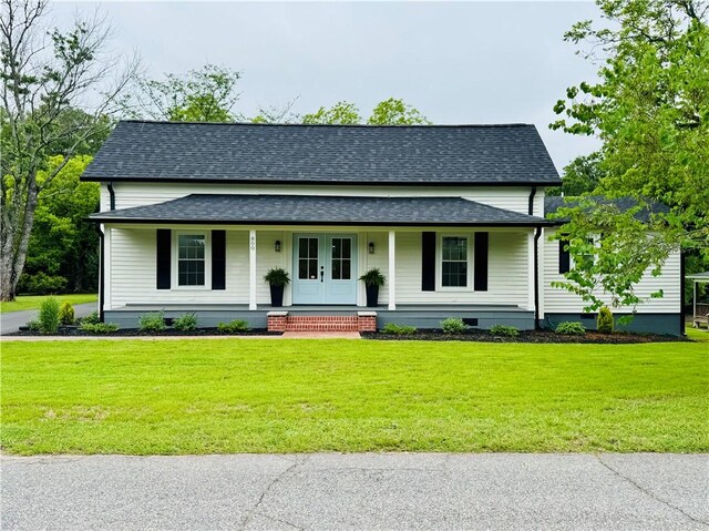800 Holiday Dam Rd, Honea Path, SC 29654 - view of front facade with a shingled roof, a porch, a front yard, and french doors