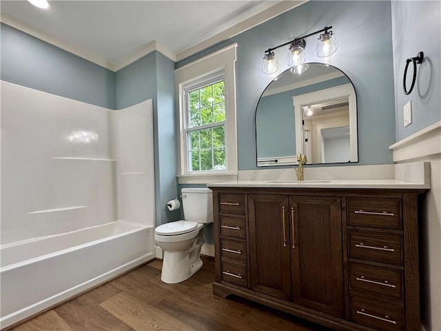 800 Holiday Dam Rd, Honea Path, SC 29654 - bathroom with wood finished floors, toilet, vanity, and bathtub / shower combination