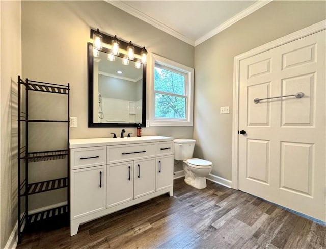 800 Holiday Dam Rd, Honea Path, SC 29654 - bathroom with ornamental molding, wood finished floors, vanity, toilet, and baseboards