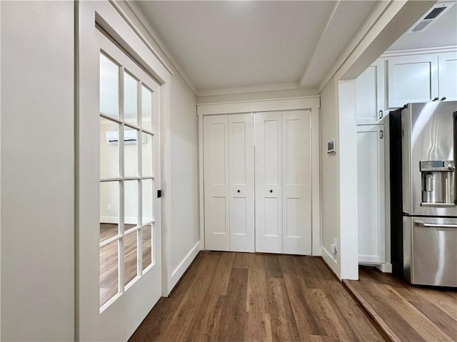800 Holiday Dam Rd, Honea Path, SC 29654 - kitchen with stainless steel refrigerator with ice dispenser, dark wood-type flooring, baseboards, and white cabinets