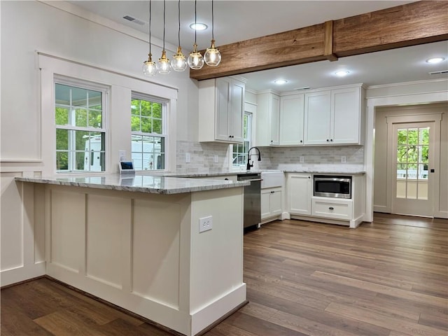 800 Holiday Dam Rd, Honea Path, SC 29654 - kitchen featuring stainless steel appliances, white cabinets, dark wood-type flooring, tasteful backsplash, and recessed lighting