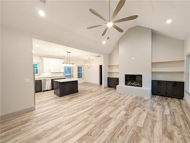 40 Pine Garden Way Dr, Salem, SC 29676 - unfurnished living room with a ceiling fan, light wood-style flooring, a chandelier, a glass covered fireplace, and baseboards