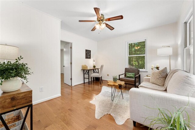 131 Shoreside Dr, Martin, GA 30557 - living area featuring a ceiling fan, light wood finished floors, and baseboards