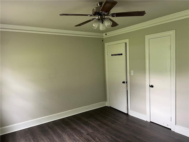 701 W Greer St, Honea Path, SC 29654 - unfurnished bedroom with crown molding, dark wood-type flooring, baseboards, and a ceiling fan