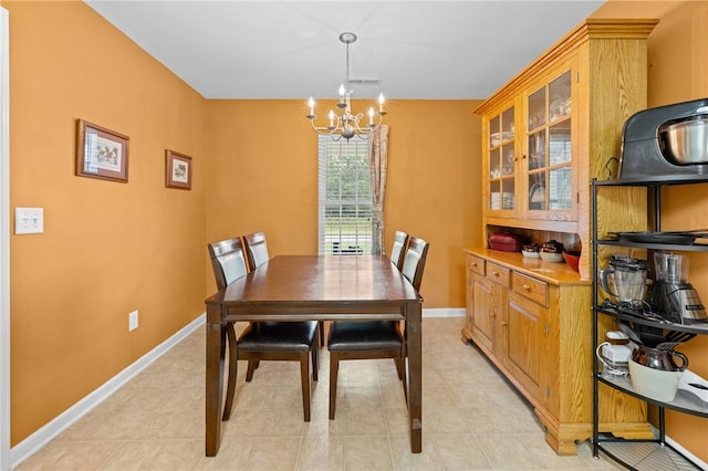 1014 Stoneham Cir, Anderson, SC 29626 - dining area with a chandelier, baseboards, and light tile patterned floors