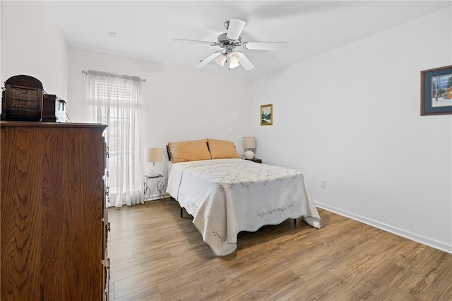 1014 Stoneham Cir, Anderson, SC 29626 - bedroom featuring wood finished floors, a ceiling fan, and baseboards