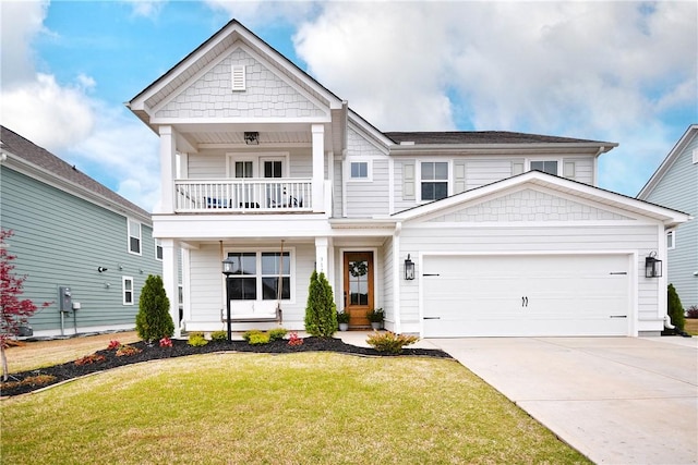 317 Encampment Blvd, Simpsonville, SC 29681 - view of front facade with concrete driveway, a front yard, a balcony, an attached garage, and a porch