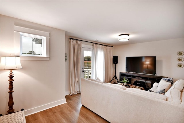 317 Encampment Blvd, Simpsonville, SC 29681 - living area featuring baseboards and light wood-style flooring
