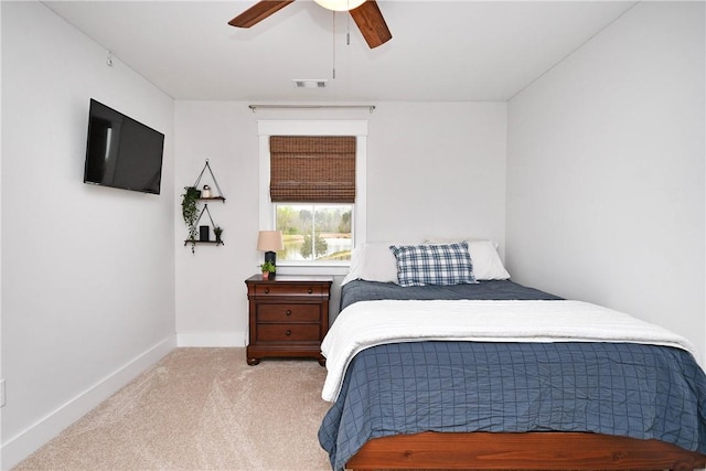 317 Encampment Blvd, Simpsonville, SC 29681 - bedroom with light carpet, baseboards, and ceiling fan