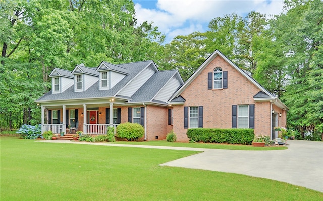 138 Grandview Ct, Hartwell, GA 30643 - new england style home with a porch, brick siding, a front lawn, and roof with shingles