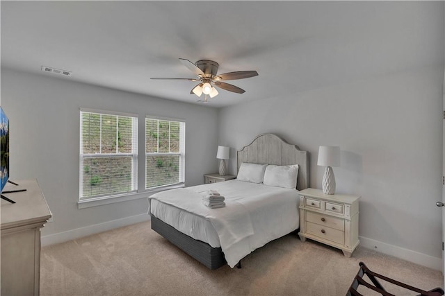 222 Grange Vally Ln, Central, SC 29630 - bedroom with baseboards, light carpet, and ceiling fan