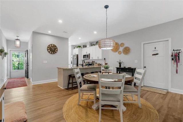324 Sweetbriar Trl, Westminster, SC 29693 - dining space featuring light wood finished floors, baseboards, and recessed lighting