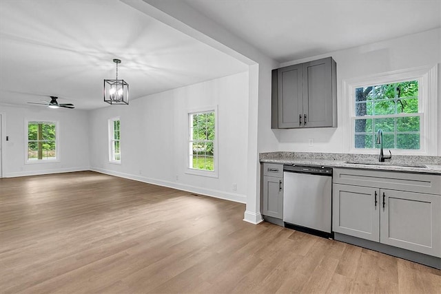 320 Fowler Rd, West Union, SC 29696 - kitchen with stainless steel dishwasher, a sink, gray cabinets, and light wood finished floors
