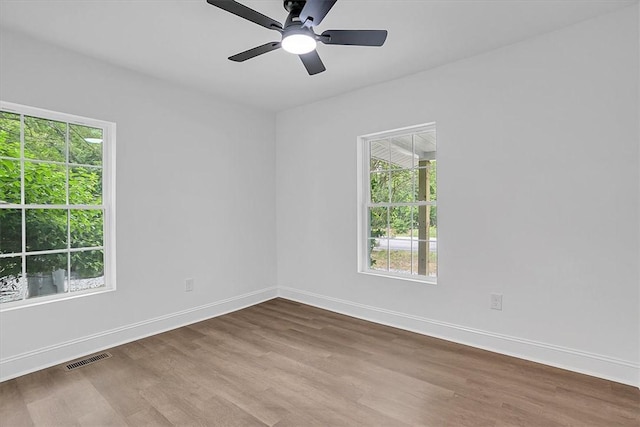 320 Fowler Rd, West Union, SC 29696 - unfurnished room featuring healthy amount of natural light, wood finished floors, and baseboards