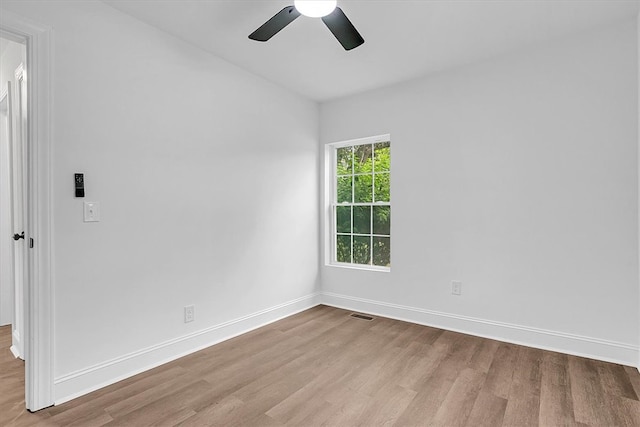 320 Fowler Rd, West Union, SC 29696 - spare room with wood finished floors, ceiling fan, and baseboards