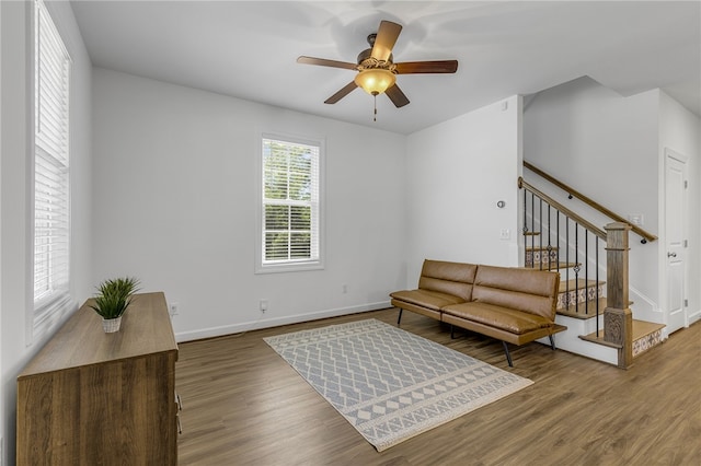 3401 Old Buncombe Rd, Greenville, SC 29617 - living area with stairway, wood finished floors, a ceiling fan, and baseboards