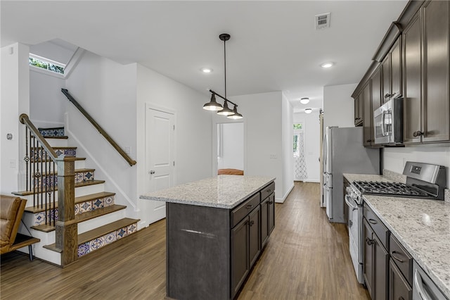 3401 Old Buncombe Rd, Greenville, SC 29617 - kitchen with appliances with stainless steel finishes, plenty of natural light, dark wood-style flooring, a center island, and recessed lighting