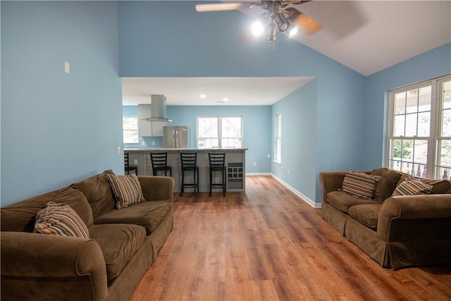 124 Grand Oak Cir, Pendleton, SC 29670 - living room featuring ceiling fan, wood finished floors, healthy amount of natural light, high vaulted ceiling, and baseboards