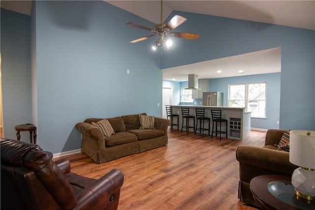 124 Grand Oak Cir, Pendleton, SC 29670 - living area with a ceiling fan, wood finished floors, high vaulted ceiling, and baseboards