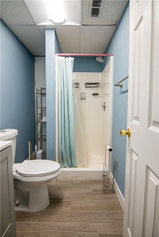 124 Grand Oak Cir, Pendleton, SC 29670 - full bath with a paneled ceiling, toilet, a shower stall, wood finished floors, and vanity