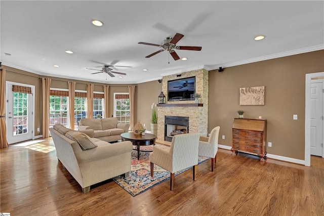 120 Red Maple Cir, Easley, SC 29642 - living area featuring crown molding, plenty of natural light, ceiling fan, a stone fireplace, and recessed lighting