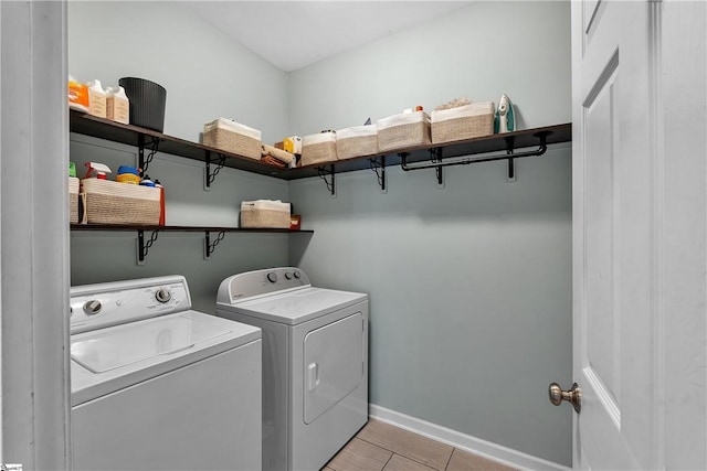 120 Red Maple Cir, Easley, SC 29642 - laundry room featuring washing machine and clothes dryer, baseboards, and light tile patterned floors