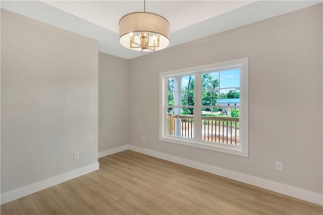 32 Pine Garden Way Dr, Salem, SC 29676 - spare room featuring baseboards, a chandelier, and wood finished floors