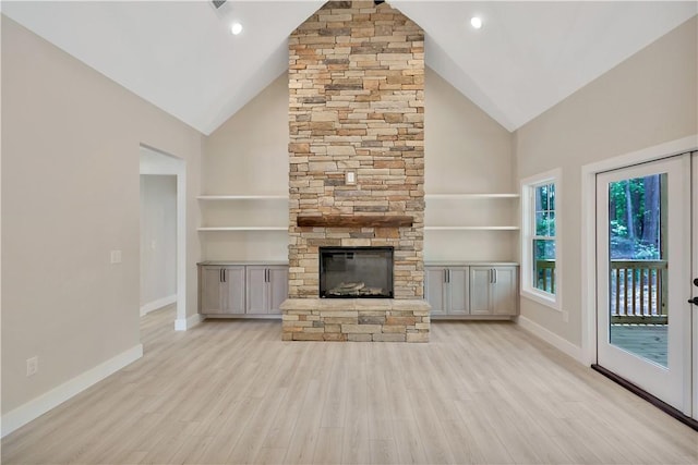 32 Pine Garden Way Dr, Salem, SC 29676 - unfurnished living room with high vaulted ceiling, a fireplace, wood finished floors, and baseboards