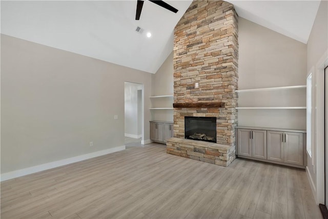 32 Pine Garden Way Dr, Salem, SC 29676 - unfurnished living room featuring high vaulted ceiling, ceiling fan, light wood-style floors, a stone fireplace, and baseboards