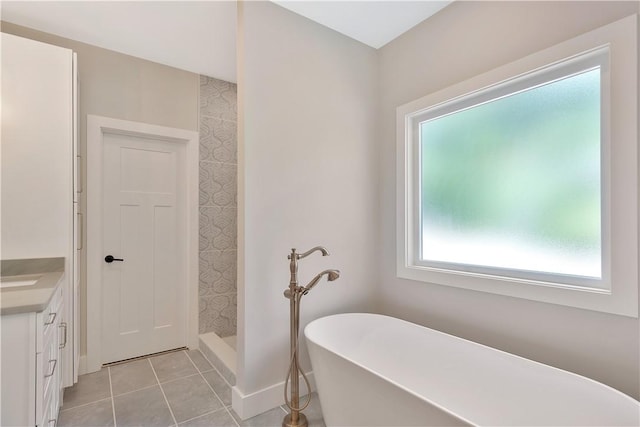 32 Pine Garden Way Dr, Salem, SC 29676 - bathroom featuring vanity, tiled shower, tile patterned flooring, a freestanding tub, and baseboards
